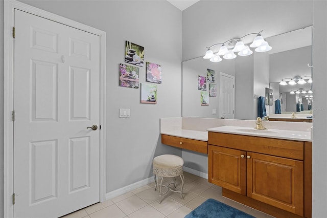 1124 Hidden Blf, Clermont, FL 34711 - bathroom with tile patterned flooring, vanity, and baseboards