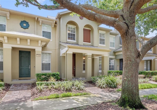 7715 Anselmo Ln, Windermere, FL 34786 - townhome / multi-family property with stucco siding