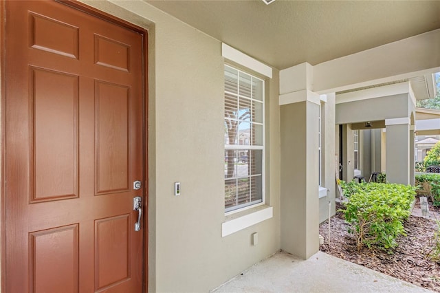 7715 Anselmo Ln, Windermere, FL 34786 - entrance to property with stucco siding