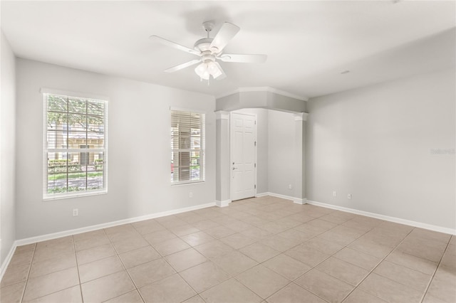 7715 Anselmo Ln, Windermere, FL 34786 - empty room with a ceiling fan, light tile patterned floors, and baseboards