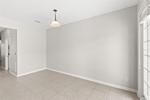 7715 Anselmo Ln, Windermere, FL 34786 - empty room with baseboards and light tile patterned flooring