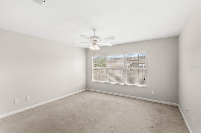 7715 Anselmo Ln, Windermere, FL 34786 - empty room featuring carpet floors, baseboards, and a ceiling fan