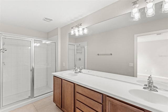 7715 Anselmo Ln, Windermere, FL 34786 - full bath with double vanity, a shower stall, and tile patterned flooring