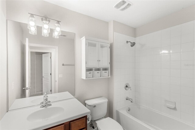 7715 Anselmo Ln, Windermere, FL 34786 - bathroom with vanity, toilet, and shower / washtub combination