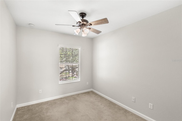 7715 Anselmo Ln, Windermere, FL 34786 - spare room featuring baseboards, light colored carpet, ceiling fan, and a smoke detector