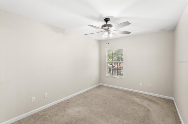7715 Anselmo Ln, Windermere, FL 34786 - carpeted empty room featuring a ceiling fan and baseboards