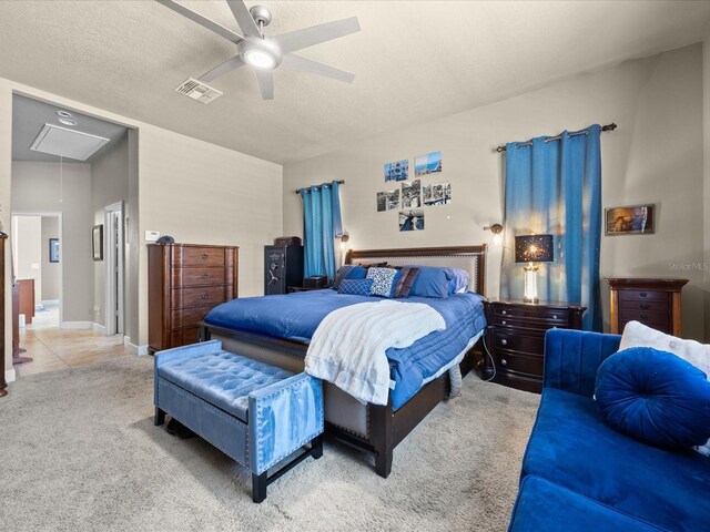 1319 Johns Cove Ln, Oakland, FL 34787 - bedroom featuring attic access, carpet floors, a ceiling fan, and a textured ceiling