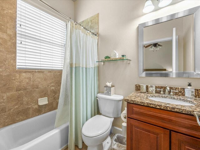 1319 Johns Cove Ln, Oakland, FL 34787 - full bath featuring toilet, vanity, and shower / tub combo