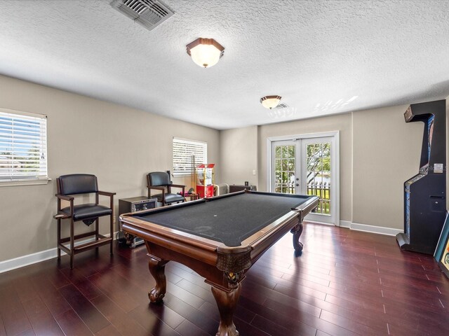1319 Johns Cove Ln, Oakland, FL 34787 - playroom with baseboards, pool table, a textured ceiling, wood finished floors, and french doors