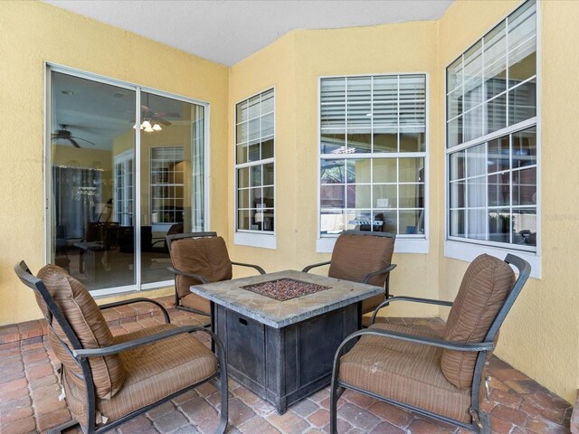 1319 Johns Cove Ln, Oakland, FL 34787 - view of patio / terrace with an outdoor fire pit