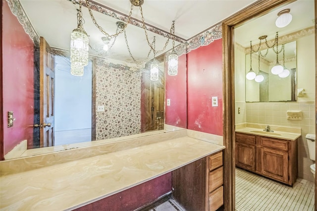 1601 Randolph St, Deltona, FL 32725 - bathroom with vanity, tile patterned flooring, and toilet