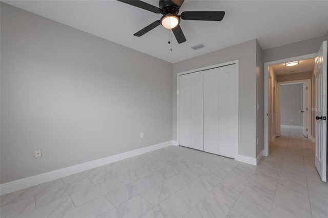 8141 Golden Chickasaw Cir, Orlando, FL 32825 - unfurnished bedroom featuring baseboards, a closet, and a ceiling fan
