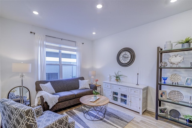625 Dogfish Ln, Debary, FL 32713 - living room with light wood-style flooring, recessed lighting, and baseboards