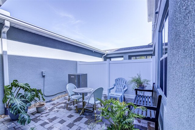 625 Dogfish Ln, Debary, FL 32713 - view of patio / terrace with central AC unit
