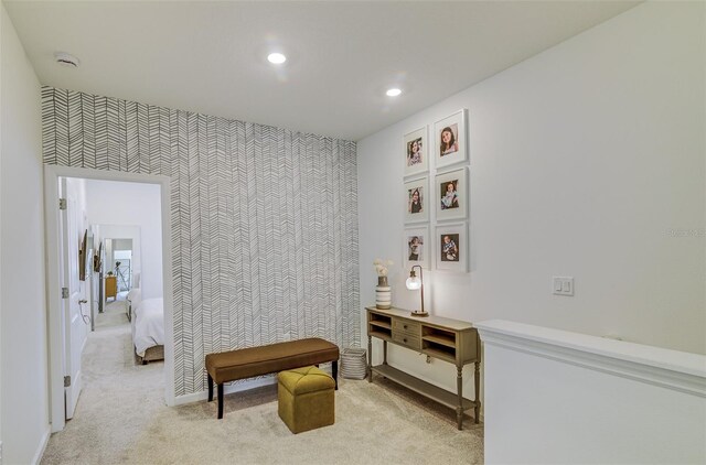 625 Dogfish Ln, Debary, FL 32713 - living area with carpet floors, an accent wall, wallpapered walls, recessed lighting, and baseboards