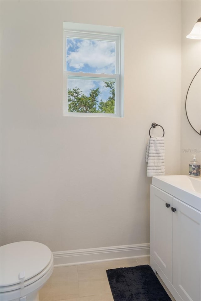 15241 Sunrise Grove Ct, Winter Garden, FL 34787 - half bathroom featuring vanity, toilet, and baseboards