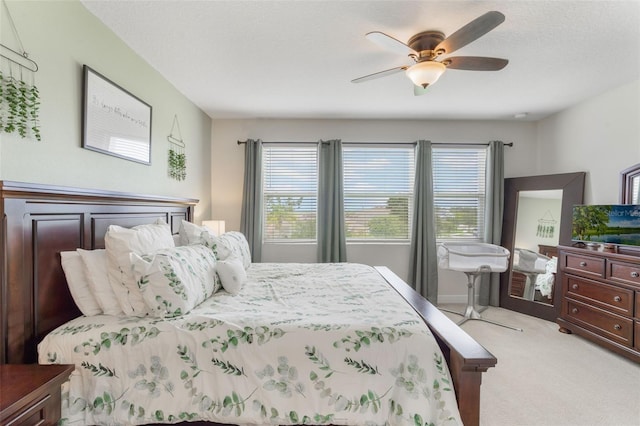 15241 Sunrise Grove Ct, Winter Garden, FL 34787 - bedroom with light colored carpet and ceiling fan