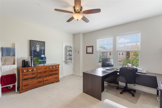 15241 Sunrise Grove Ct, Winter Garden, FL 34787 - home office with a ceiling fan, light colored carpet, and baseboards