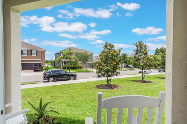 15241 Sunrise Grove Ct, Winter Garden, FL 34787 - view of grassy yard featuring a residential view