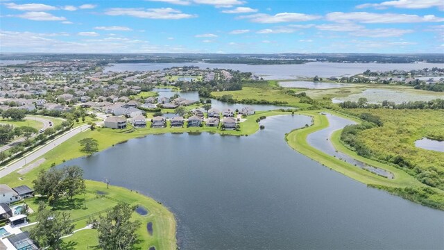 15241 Sunrise Grove Ct, Winter Garden, FL 34787 - aerial view of property and surrounding area with a large body of water and nearby suburban area