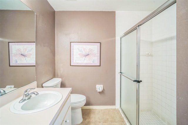 2015 Gardenia Landings Ln, Sun City Center, FL 33573 - full bath featuring toilet, a shower stall, vanity, and tile patterned flooring
