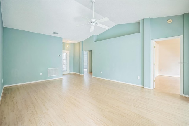 2015 Gardenia Landings Ln, Sun City Center, FL 33573 - unfurnished room with ceiling fan, light wood-style flooring, baseboards, a smoke detector, and high vaulted ceiling