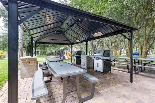 110 Watling Way Unit 25204, Davenport, FL 33837 - view of patio / terrace with a playground and a grill
