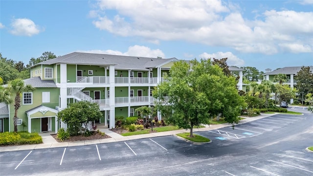 110 Watling Way Unit 25204, Davenport, FL 33837 - view of property featuring uncovered parking