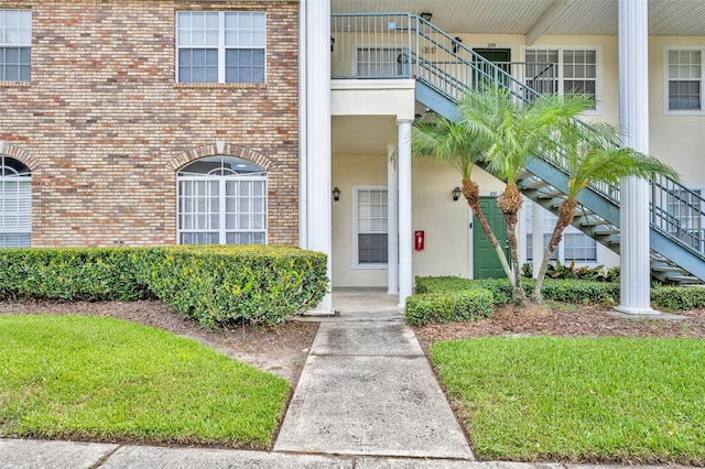141 Reserve Cir Unit 113, Oviedo, FL 32765 - entrance to property featuring brick siding