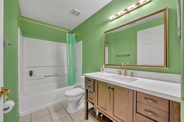 141 Reserve Cir Unit 113, Oviedo, FL 32765 - bathroom with toilet, vanity, tile patterned flooring, and shower / bath combo