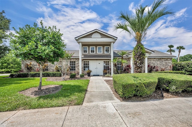 141 Reserve Cir Unit 113, Oviedo, FL 32765 - traditional home featuring a front yard