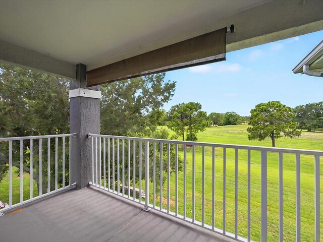 13917 Fairway Island Dr Unit 931, Orlando, FL 32837 - wooden terrace featuring a lawn