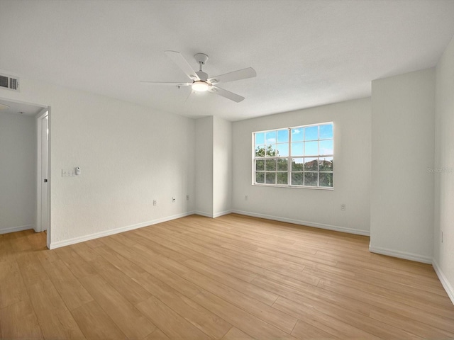 13917 Fairway Island Dr Unit 931, Orlando, FL 32837 - unfurnished room with light wood-style flooring, ceiling fan, and baseboards