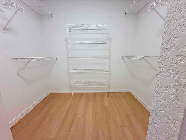 13917 Fairway Island Dr Unit 931, Orlando, FL 32837 - spacious closet featuring light wood-type flooring