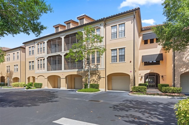 500 Mirasol Cir Unit 203, Celebration, FL 34747 - view of property with a garage