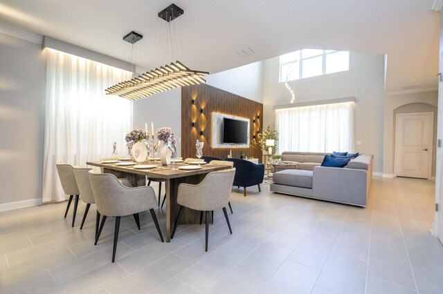 8964 Takeaway Way, Davenport, FL 33896 - dining room featuring ornamental molding, light tile patterned floors, and baseboards
