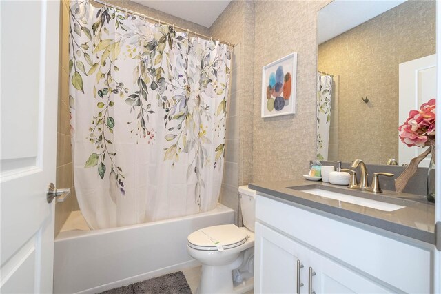 8964 Takeaway Way, Davenport, FL 33896 - bathroom featuring toilet, vanity, and shower / bath combo with shower curtain