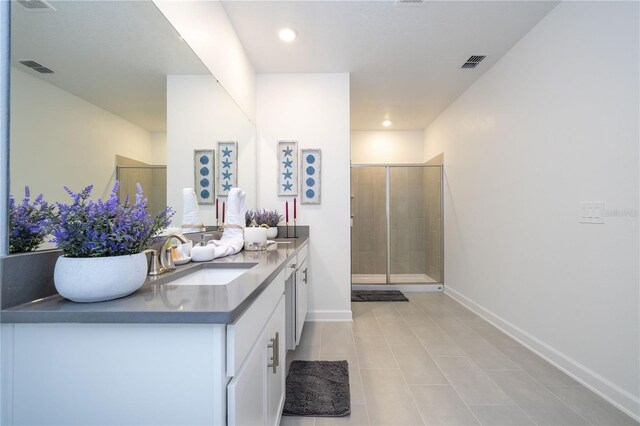 8964 Takeaway Way, Davenport, FL 33896 - bathroom featuring vanity, a stall shower, tile patterned floors, baseboards, and recessed lighting