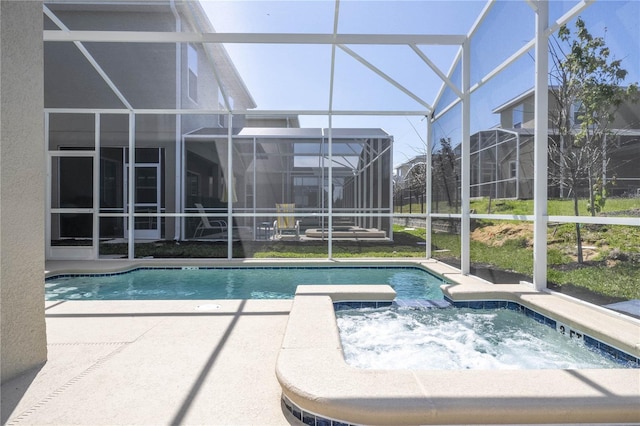 8964 Takeaway Way, Davenport, FL 33896 - view of swimming pool with glass enclosure, a patio, and a pool with connected hot tub