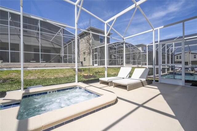 8964 Takeaway Way, Davenport, FL 33896 - view of swimming pool with an in-ground hot tub, glass enclosure, and a patio
