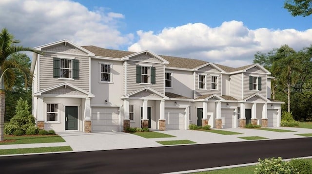 2679 Skyline Loop, Kissimmee, FL 34758 - view of property featuring driveway, an attached garage, and stone siding