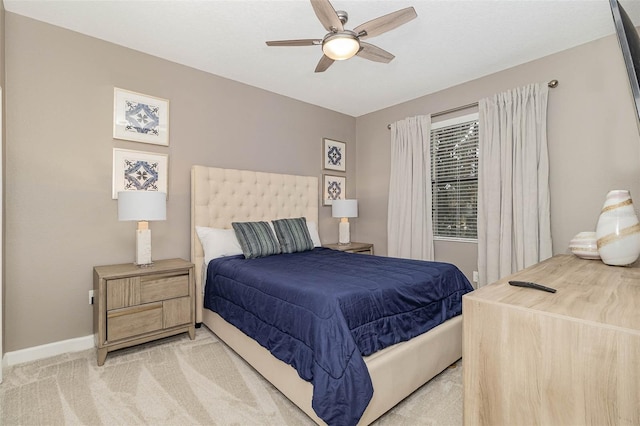 1403 Rolling Fairway Dr, Davenport, FL 33896 - bedroom featuring light carpet, baseboards, and ceiling fan
