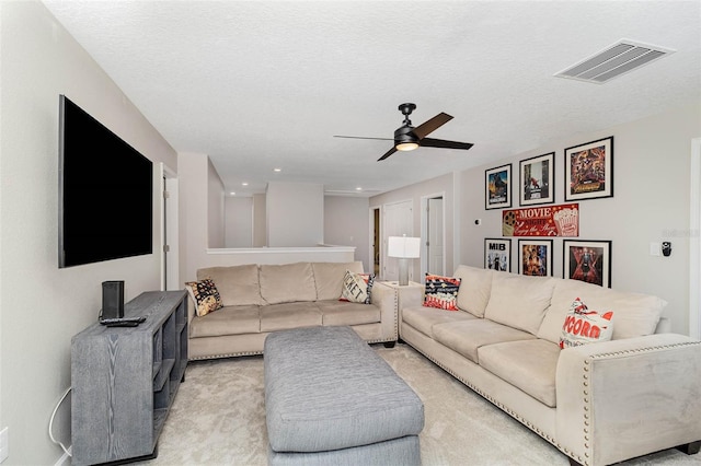 1403 Rolling Fairway Dr, Davenport, FL 33896 - living room featuring a ceiling fan and light colored carpet