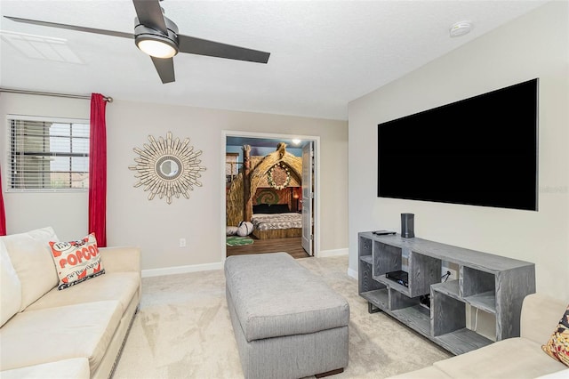 1403 Rolling Fairway Dr, Davenport, FL 33896 - living room with carpet floors, a ceiling fan, and baseboards