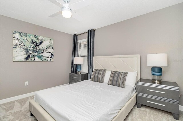 1403 Rolling Fairway Dr, Davenport, FL 33896 - bedroom with light carpet, baseboards, and ceiling fan