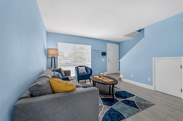 752 Howland Ln Unit 114, Altamonte Springs, FL 32701 - living area featuring wood tiled floors and baseboards