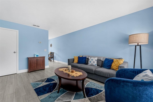 752 Howland Ln Unit 114, Altamonte Springs, FL 32701 - living area with baseboards and light wood-type flooring