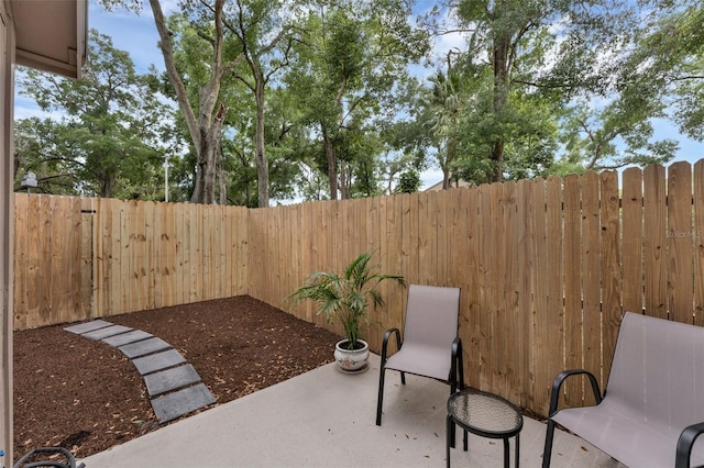 752 Howland Ln Unit 114, Altamonte Springs, FL 32701 - fenced backyard with a patio area