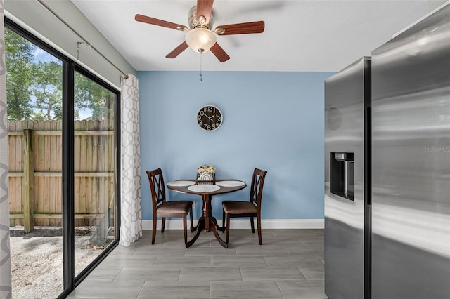 752 Howland Ln Unit 114, Altamonte Springs, FL 32701 - dining area featuring ceiling fan and baseboards