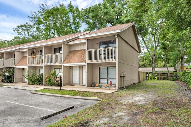 752 Howland Ln Unit 114, Altamonte Springs, FL 32701 - view of building exterior with uncovered parking